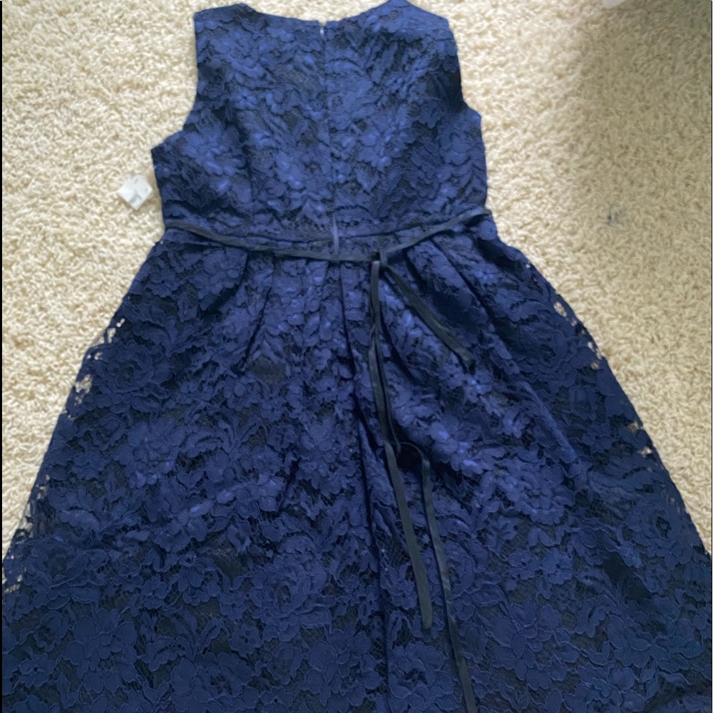 Girls size 14 royal/dark blue dress by designer “Helen”;has zip close;ribbon tie
